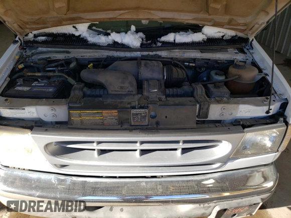 1999 Ford Econoline Passenger XL with VIN 1FBSS31L0XHB37226, listed as a Copart auction lot 46419355 with 51,209 mi miles and Clean Title. Bid and sale history available at DreamBid. Image 12.
