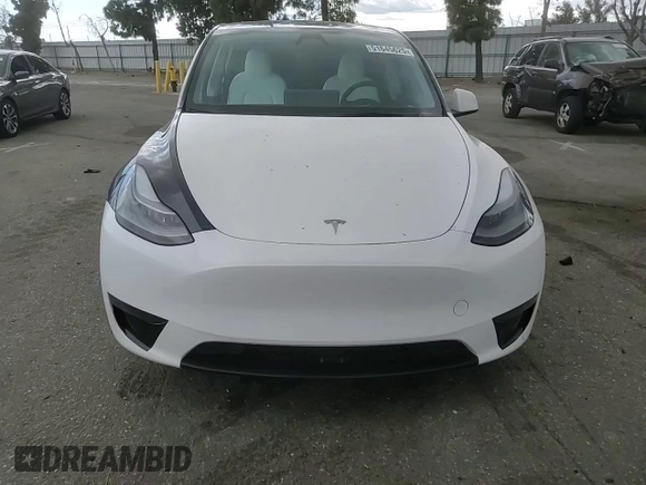 2023 Tesla Model Y Long Range z VIN 7SAYGDEE3PF916132, wystawiony jako Copart lot #51645625 z przebiegiem 28 238 mil mil oraz Szkoda całkowita • Salvage title. Historia ofert i sprzedaży dostępna na DreamBid. Obrazek 10.