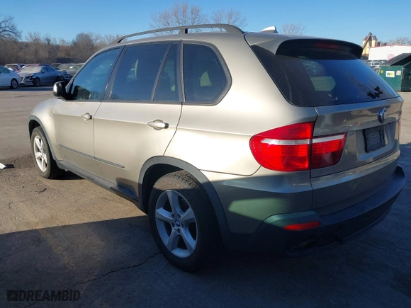 2007 BMW X5 3.0si with VIN 5UXFE43557L011254, listed as a IAAI auction lot 41696843 with 201,402 mi miles. Bid and sale history available at carsss.com. Image 3.