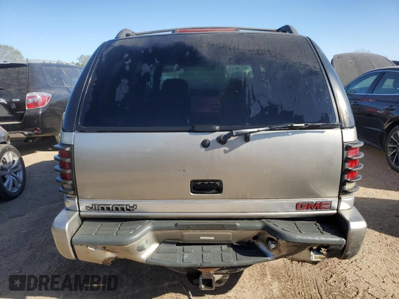 1999 GMC Jimmy SLE with VIN 1GKDT13W1X2537011, listed as a Copart auction lot 76623754 with 212,083 mi miles and Salvage Title. Bid and sale history available at carsss.com. Image 6.