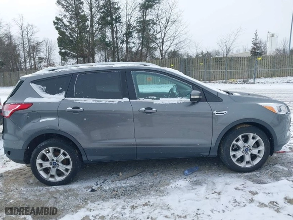 2014 Ford Escape Titanium with VIN 1FMCU9J96EUC86659, listed as a IAAI auction lot 41624927 with 177,372 mi miles. Bid and sale history available at carsss.com. Image 14.