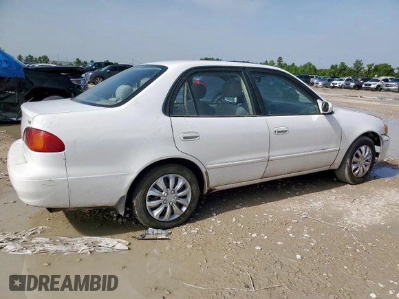 2002 Toyota Corolla CE with VIN 1NXBR12E32Z592708, listed as a Copart auction lot 62866195 with 226,871 mi miles and Clean title. Bid and sale history available at DreamBid. Image 3.