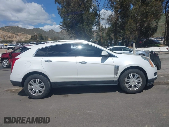 2015 Cadillac SRX Luxury Collection with VIN 3GYFNBE38FS584296, listed as a IAAI auction lot 41950092 with 56,691 mi miles and . Bid and sale history available at carsss.com. Image 14.