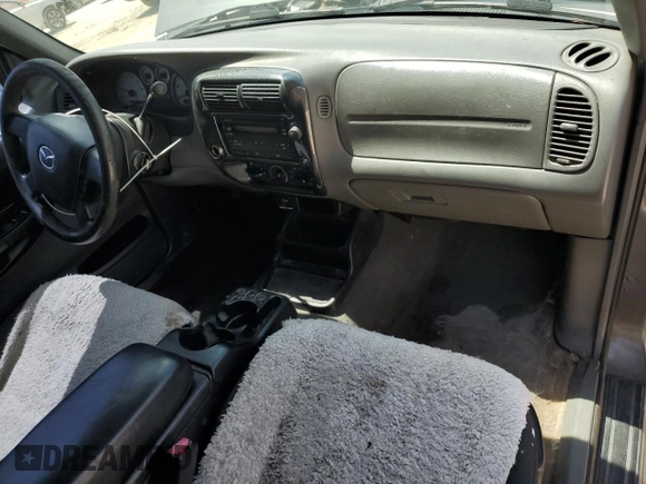 2005 Mazda B-Series Truck z VIN 4F4YR46U85PM05409, wystawiony jako Copart lot #58820575 z przebiegiem 127 258 mil mil oraz Szkoda całkowita • Salvage title. Historia ofert i sprzedaży dostępna na DreamBid. Obrazek 8.