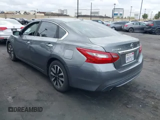 2018 Nissan Altima SV with VIN 1N4AL3AP3JC255885, listed as a IAAI auction lot 42033198 with 134,998 mi miles and . Bid and sale history available at DreamBid. Image 3.