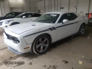 2012 Dodge Challenger SXT Plus z VIN 2C3CDYAG6CH106534, wystawiony jako Copart lot #52397055 z przebiegiem 183 590 mil mil oraz Szkoda całkowita • Salvage title. Historia ofert i sprzedaży dostępna na DreamBid. Obrazek 1.