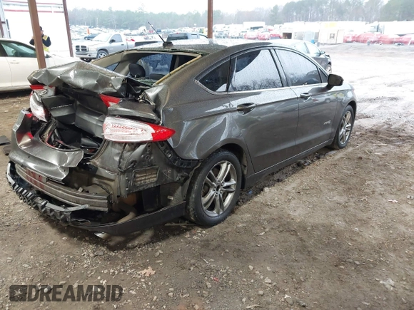 2015 Ford Fusion SE Hybrid with VIN 3FA6P0LU6FR248904, listed as a IAAI auction lot 41556607 with 224,799 mi miles. Bid and sale history available at carsss.com. Image 4.