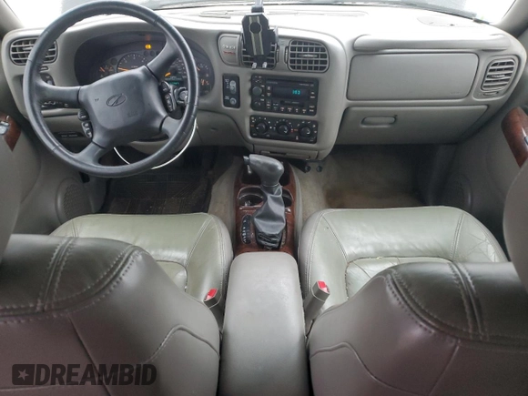 2000 Oldsmobile Bravada z VIN 1GHDT13W5Y2311819, wystawiony jako Copart lot #44839145 z przebiegiem 163 427 mil mil oraz Tytuł czysty. Historia ofert i sprzedaży dostępna na DreamBid. Obrazek 8.