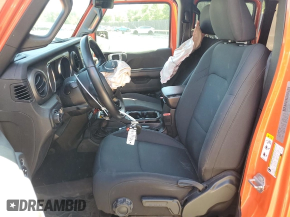 2019 Jeep Wrangler Unlimited Sport S with VIN 1C4HJXDG2KW516005, listed as a Copart auction lot 57330645 with 59,706 mi miles and Salvage title. Bid and sale history available at DreamBid. Image 7.