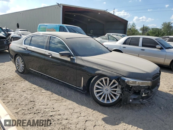 2022 BMW 7 Series 740i xDrive with VIN WBA7T4C07NCH70453, listed as a Copart auction lot 71671304 with 44,673 mi miles and Clean title. Bid and sale history available at DreamBid. Image 4.