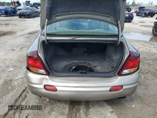 2001 Oldsmobile Aurora z VIN 1G3GR64H914122292, wystawiony jako Copart lot #75867154 z przebiegiem 120 977 mil mil oraz Szkody całkowita. Historia ofert i sprzedaży dostępna na DreamBid. Obrazek 6.