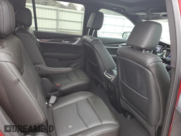 2023 Cadillac XT6 AWD Sport z VIN 1GYKPGRS5PZ221207, wystawiony jako Copart lot #41876425 z przebiegiem 23 193 mil mil oraz Szkody całkowita. Historia ofert i sprzedaży dostępna na DreamBid. Obrazek 11.