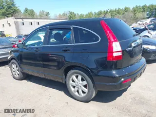 2009 Honda CR-V EX-L with VIN JHLRE48799C012129, listed as a IAAI auction lot 42016110 with 141,819 mi miles. Bid and sale history available at carsss.com. Image 15.
