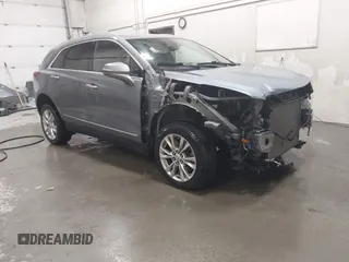 2021 Cadillac XT5 AWD Luxury with VIN 1GYKNBR42MZ165944, listed as a IAAI auction lot 42062750 with 51,592 mi miles and . Bid and sale history available at DreamBid. Image 1.