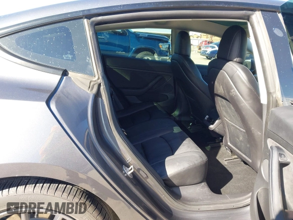 2022 Tesla Model 3 Long Range z VIN 5YJ3E1EB9NF197127, wystawiony jako IAAI lot #41366323 z przebiegiem 56 559 mil mil oraz . Historia ofert i sprzedaży dostępna na DreamBid. Obrazek 8.