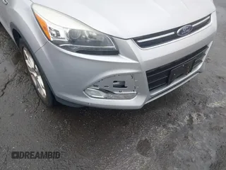 2016 Ford Escape Titanium with VIN 1FMCU0JX7GUB25573, listed as a IAAI auction lot 41871980 with 157,525 mi miles. Bid and sale history available at carsss.com. Image 6.