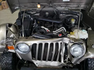 2004 Jeep Wrangler Sahara with VIN 1J4FA59S14P770952, listed as a Copart auction lot 66498694 with 112,649 mi miles and Salvage Title. Bid and sale history available at carsss.com. Image 12.