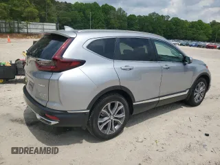 2020 Honda CR-V Touring z VIN 7FART6H94LE013557, wystawiony jako Copart lot #54605755 z przebiegiem 42 554 mil mil oraz Szkoda całkowita • Salvage title. Historia ofert i sprzedaży dostępna na DreamBid. Obrazek 3.