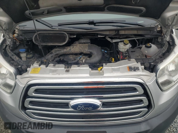2016 Ford Transit XL z VIN 1FMZK1YM0GKB22625, wystawiony jako Copart lot #63874365 z przebiegiem 162 006 mil mil oraz Szkoda całkowita • Salvage title. Historia ofert i sprzedaży dostępna na DreamBid. Obrazek 11.