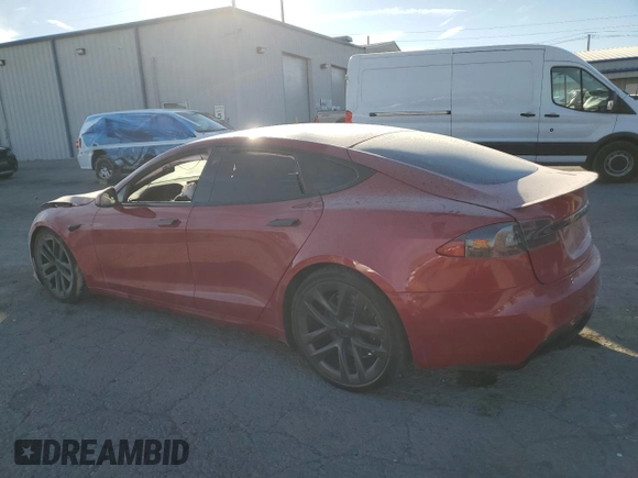 2021 Tesla Model S Plaid z VIN 5YJSA1E65MF435922, wystawiony jako Copart lot #77417854 z przebiegiem Nie podano mil oraz Szkoda całkowita • Salvage title. Historia ofert i sprzedaży dostępna na DreamBid. Obrazek 2.