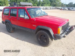 1996 Jeep Cherokee Sport with VIN 1J4FT68S4TL326973, listed as a IAAI auction lot 42744791 with 215,905 mi miles and . Bid and sale history available at DreamBid. Image 1.