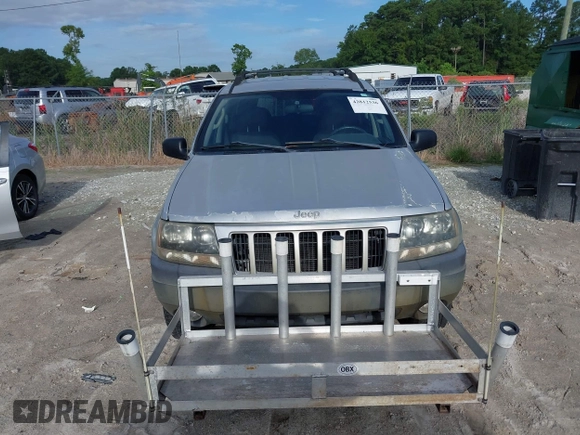 2004 Jeep Grand Cherokee Laredo z VIN 1J4GW48S94C372798, wystawiony jako IAAI lot #42812536 z przebiegiem 113 960 mil mil oraz . Historia ofert i sprzedaży dostępna na DreamBid. Obrazek 6.