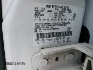 2006 Ford F-350 with VIN 1FTWW30P46EC47122, listed as a Copart auction lot 71742404 with 185,108 mi miles and Salvage title. Bid and sale history available at DreamBid. Image 12.