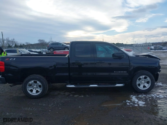 2018 Chevrolet Silverado 1500 LT with VIN 1GCVKREC1JZ349561, listed as a IAAI auction lot 41277292 with 102,525 mi miles. Bid and sale history available at carsss.com. Image 13.