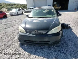2002 Toyota Camry XLE z VIN 4T1BF30K12U020467, wystawiony jako Copart lot #54628995 z przebiegiem 222 898 mil mil oraz Szkoda całkowita • Salvage title. Historia ofert i sprzedaży dostępna na DreamBid. Obrazek 14.