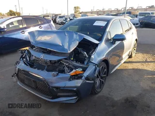 2022 Toyota Corolla SE with VIN JTDS4MCE9NJ082078, listed as a IAAI auction lot 41291406 with 57,202 mi miles and . Bid and sale history available at DreamBid. Image 2.