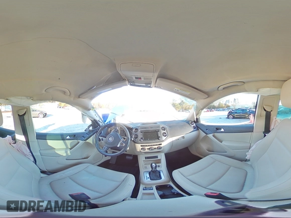 2014 Volkswagen Tiguan SE z VIN WVGAV3AX1EW523157, wystawiony jako Copart lot #82111894 z przebiegiem 103 172 mil mil oraz Szkoda całkowita • Salvage title. Historia ofert i sprzedaży dostępna na DreamBid. Obrazek 14.