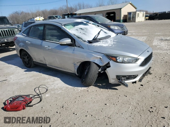 2016 Ford Focus SE with VIN 1FADP3F26GL332241, listed as a Copart auction lot 41868995 with 162,401 mi miles and Salvage Title. Bid and sale history available at DreamBid. Image 4.