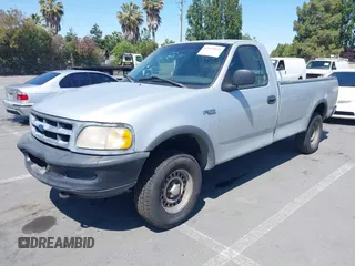 1997 Ford F-150 with VIN 1FTDF1828VKA26577, listed as a IAAI auction lot 42625435 with 310,779 mi miles and . Bid and sale history available at DreamBid. Image 2.