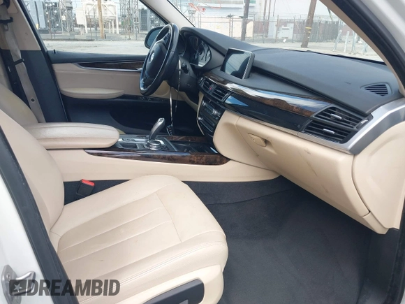 2016 BMW X5 sDrive35i with VIN 5UXKR2C55G0H43136, listed as a IAAI auction lot 41835931 with 125,751 mi miles. Bid and sale history available at carsss.com. Image 5.
