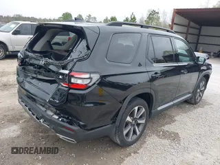 2024 Honda Pilot Elite with VIN 5FNYG1H87RB035776, listed as a IAAI auction lot 41721644 with 14,697 mi miles. Bid and sale history available at carsss.com. Image 4.