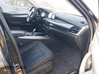 2014 BMW X5 xDrive35d with VIN 5UXKS4C57E0J93982, listed as a IAAI auction lot 42085173 with 169,908 mi miles. Bid and sale history available at carsss.com. Image 5.
