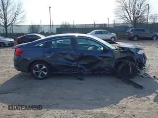 2020 Honda Civic LX z VIN 2HGFC2F61LH570034, wystawiony jako IAAI lot #41784357 z przebiegiem Nie podano mil oraz . Historia ofert i sprzedaży dostępna na DreamBid. Obrazek 12.