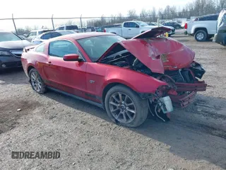 2010 Ford Mustang GT with VIN 1ZVBP8CH2A5139780, listed as a IAAI auction lot 41670056 with 95,000 mi miles. Bid and sale history available at carsss.com. Image 1.