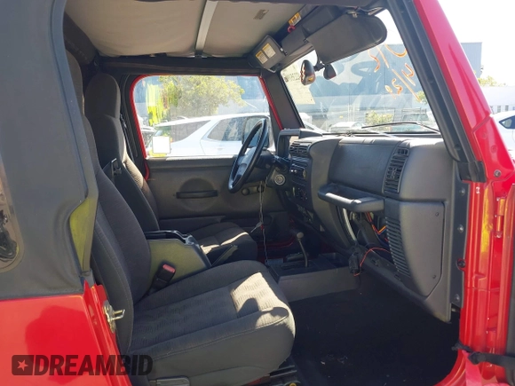 2005 Jeep Wrangler Unlimited with VIN 1J4FA44S65P324248, listed as a IAAI auction lot 42235190 with 86,971 mi miles and . Bid and sale history available at DreamBid. Image 5.