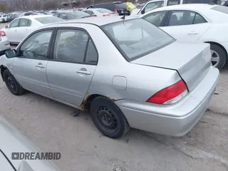 2002 Mitsubishi Lancer ES with VIN JA3AJ26E62U060214, listed as a IAAI auction lot 40961872 with 150,399 mi miles. Bid and sale history available at carsss.com. Image 3.