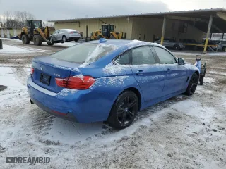 2015 BMW 4 Series 428i xDrive with VIN WBA4C9C50FD330529, listed as a Copart auction lot 87811935 with 111,899 mi miles and Salvage Title. Bid and sale history available at carsss.com. Image 3.