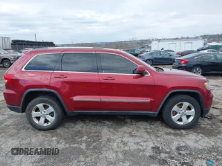 2012 Jeep Grand Cherokee Laredo with VIN 1C4RJFAG7CC221682, listed as a IAAI auction lot 41881922 with 218,762 mi miles. Bid and sale history available at carsss.com. Image 13.