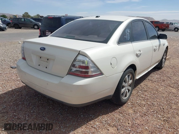2009 Ford Taurus SEL with VIN 1FAHP24WX9G104546, listed as a IAAI auction lot 42047740 with 111,790 mi miles. Bid and sale history available at carsss.com. Image 4.