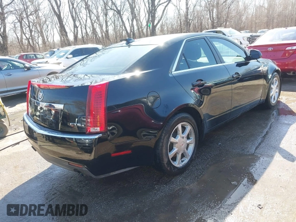 2009 Cadillac CTS AWD z VIN 1G6DH577290166448, wystawiony jako IAAI lot #41751610 z przebiegiem 158 378 mil mil oraz . Historia ofert i sprzedaży dostępna na DreamBid. Obrazek 4.