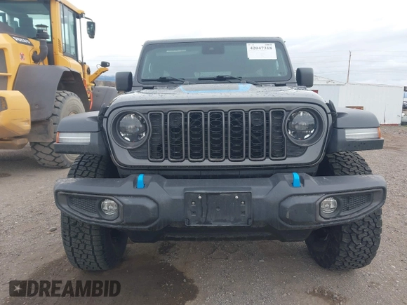 2024 Jeep Wrangler Rubicon z VIN 1C4RJXR67RW276710, wystawiony jako IAAI lot #42047318 z przebiegiem 35 857 mil mil oraz . Historia ofert i sprzedaży dostępna na DreamBid. Obrazek 12.
