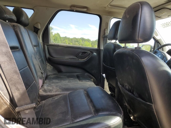 2005 Ford Escape Limited with VIN 1FMYU041X5KC72704, listed as a Copart auction lot 57819655 with 179,469 mi miles and Salvage title. Bid and sale history available at DreamBid. Image 11.