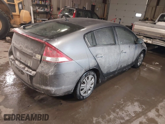 2011 Honda Insight with VIN JHMZE2H37BS004281, listed as a IAAI auction lot 41636305 with 273,063 mi miles and . Bid and sale history available at DreamBid. Image 4.