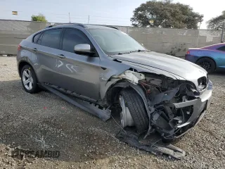 2012 BMW X6 50i z VIN 5UXFG8C53CL590367, wystawiony jako Copart lot #86650664 z przebiegiem Nie podano mil oraz Szkoda całkowita • Salvage title. Historia ofert i sprzedaży dostępna na DreamBid. Obrazek 4.