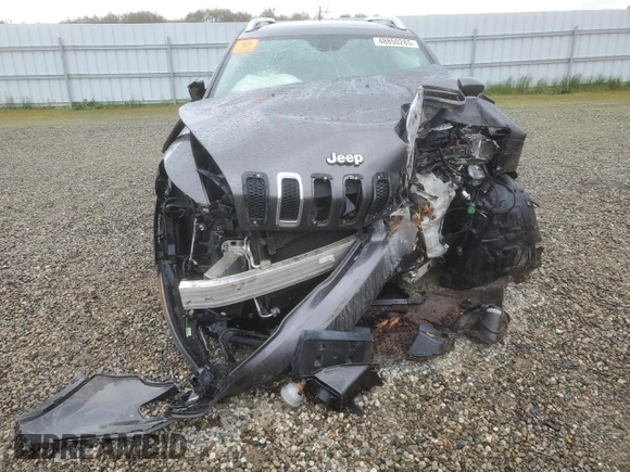 2014 Jeep Cherokee Latitude with VIN 1C4PJMCS7EW297014, listed as a Copart auction lot 48850285 with 0 mi miles and Salvage Title. Bid and sale history available at carsss.com. Image 5.