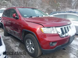 2012 Jeep Grand Cherokee Laredo with VIN 1C4RJFAGXCC174678, listed as a IAAI auction lot 41347849 with 134,156 mi miles. Bid and sale history available at carsss.com. Image 1.